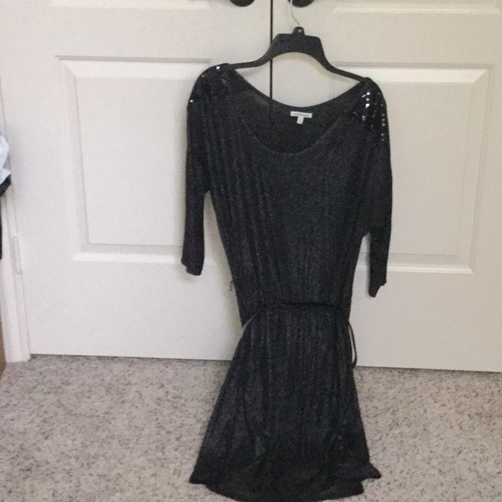Shiny dress with sequins on shoulders